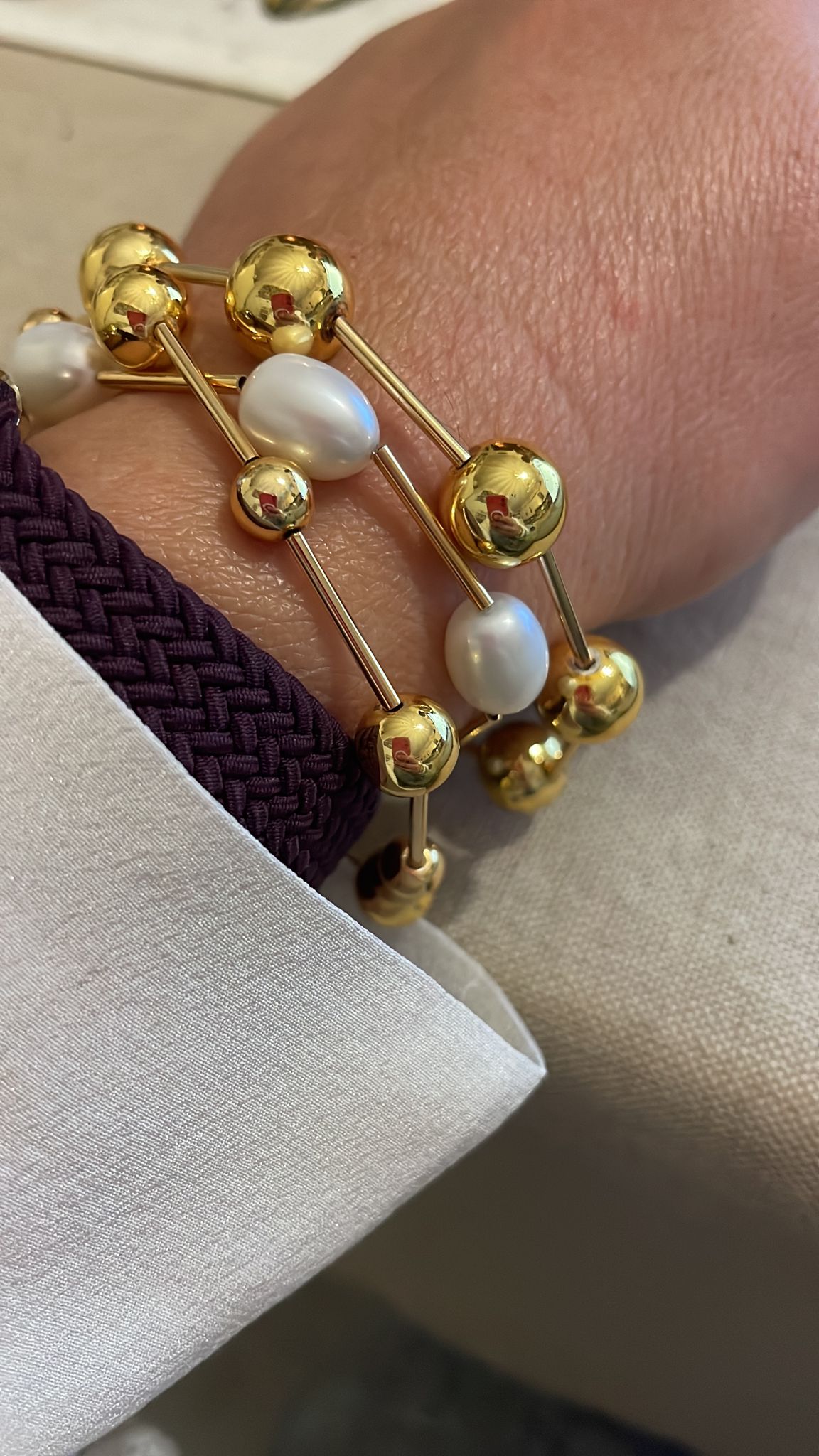 Bracciali PEARL e GOLD indossati insieme