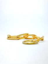 Load image into Gallery viewer, Close up del bracciale CATENA in giallo oro
