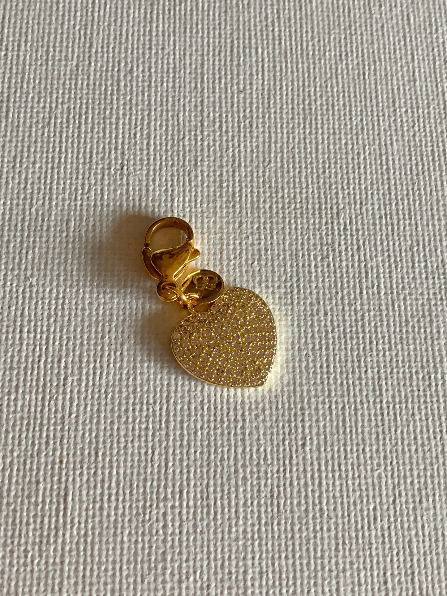 Il cuore DIA, in ottone dorato e zirconi vedrai che luce